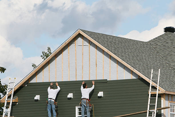 Professional Siding technician working in Thornton, PA